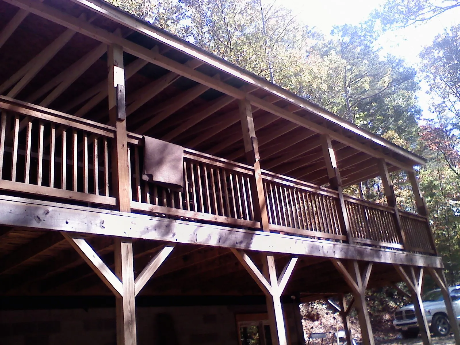 Timber framing under a new elevated porch and deck — Roof Leak Repair in Reed by Roofing Brothers